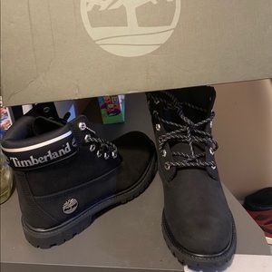 Black and silver timberland